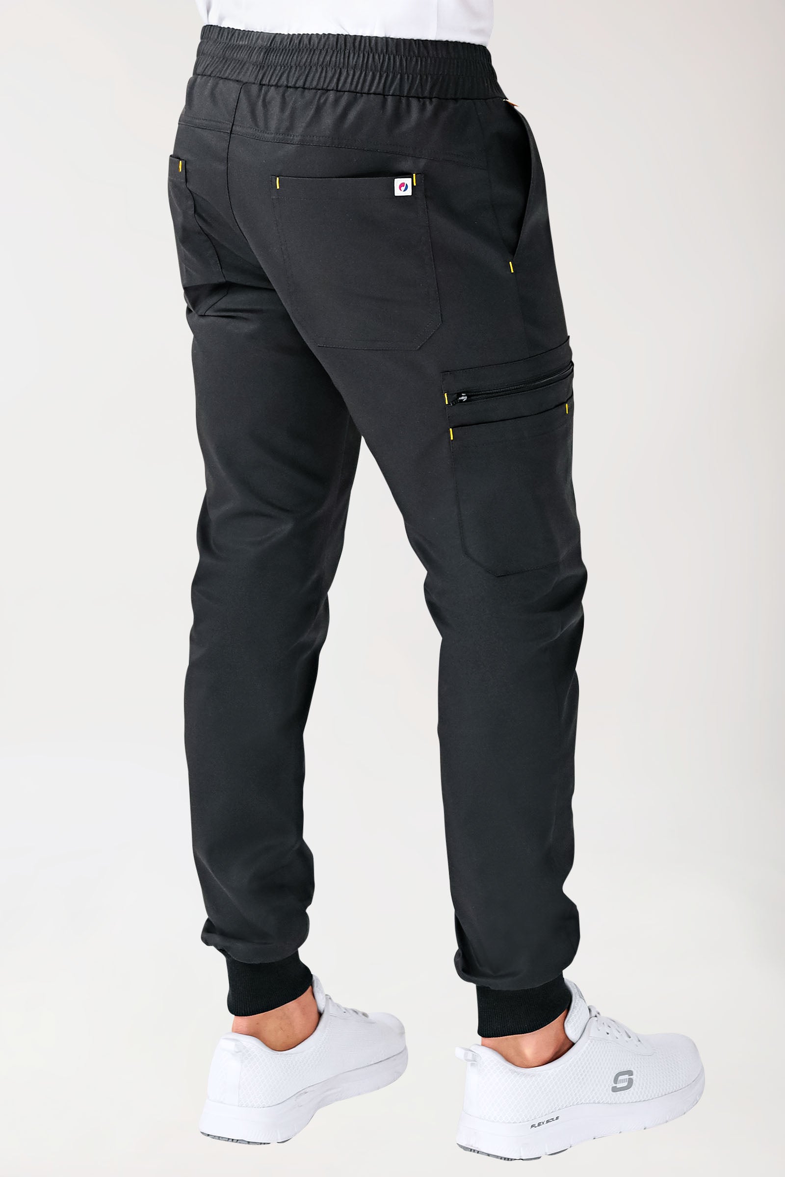 CLINIC STRETCH Hose Herren - Saumbündchen schwarz/gelb