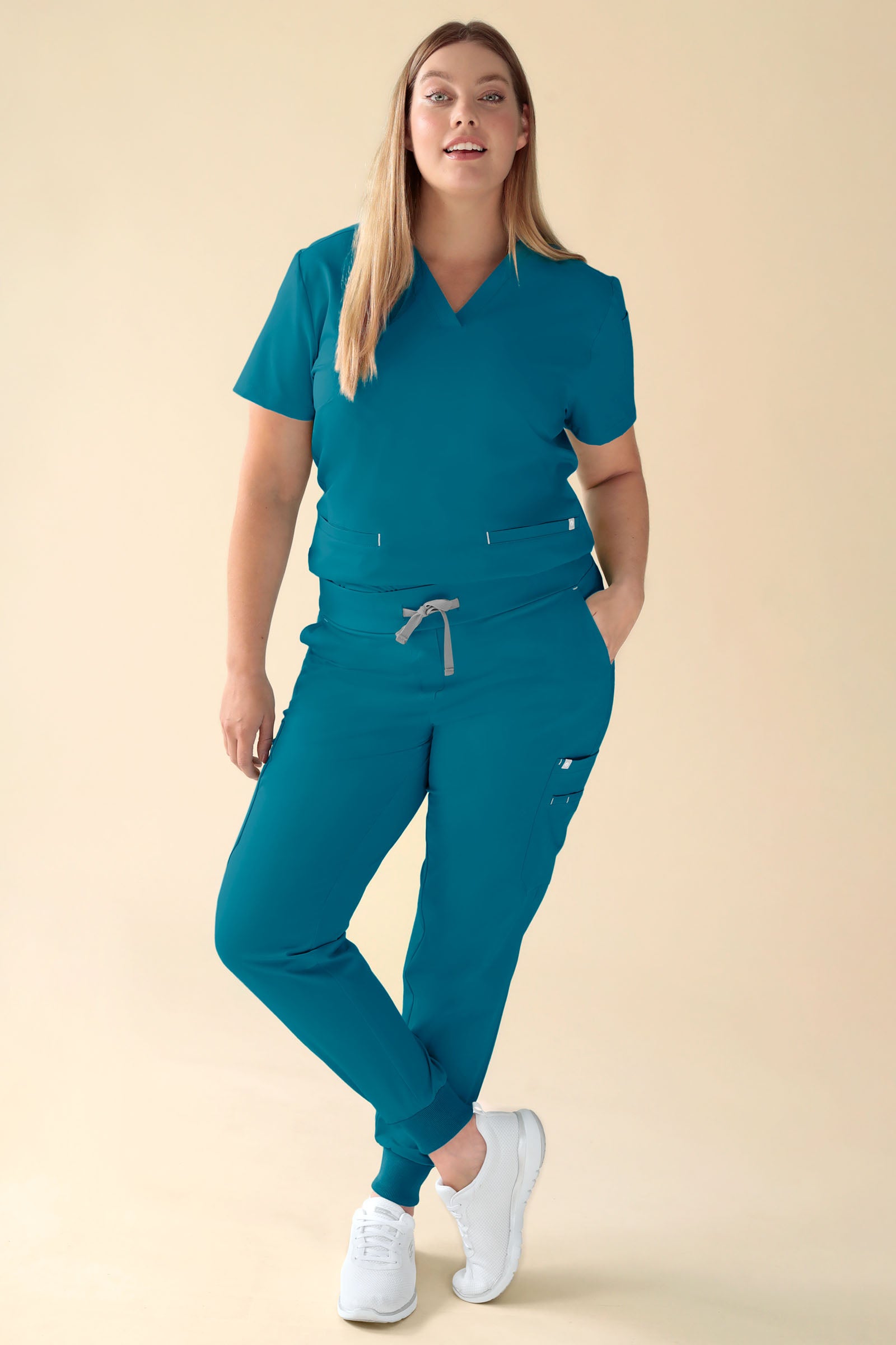 KAERE Hose Damen - Saumbündchen mit Beintaschen petrol