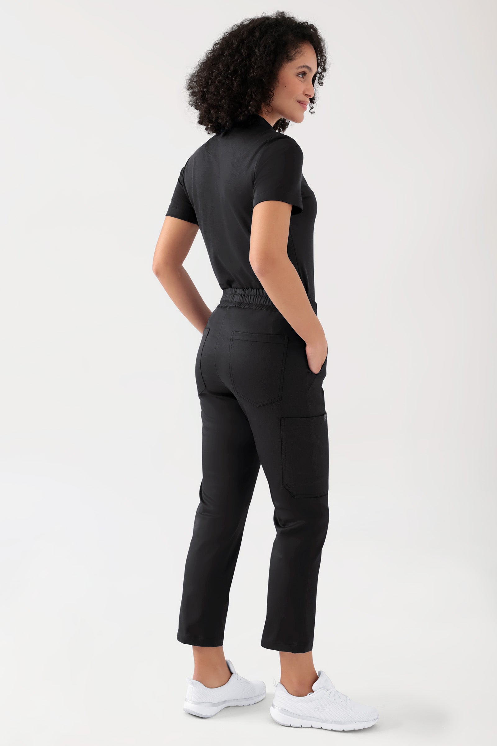 COMFY FLEX Stretch Hose Unisex - 7/8 Länge schwarz, Vue de dos Le mannequin mesure 176 cm et porte la taille S